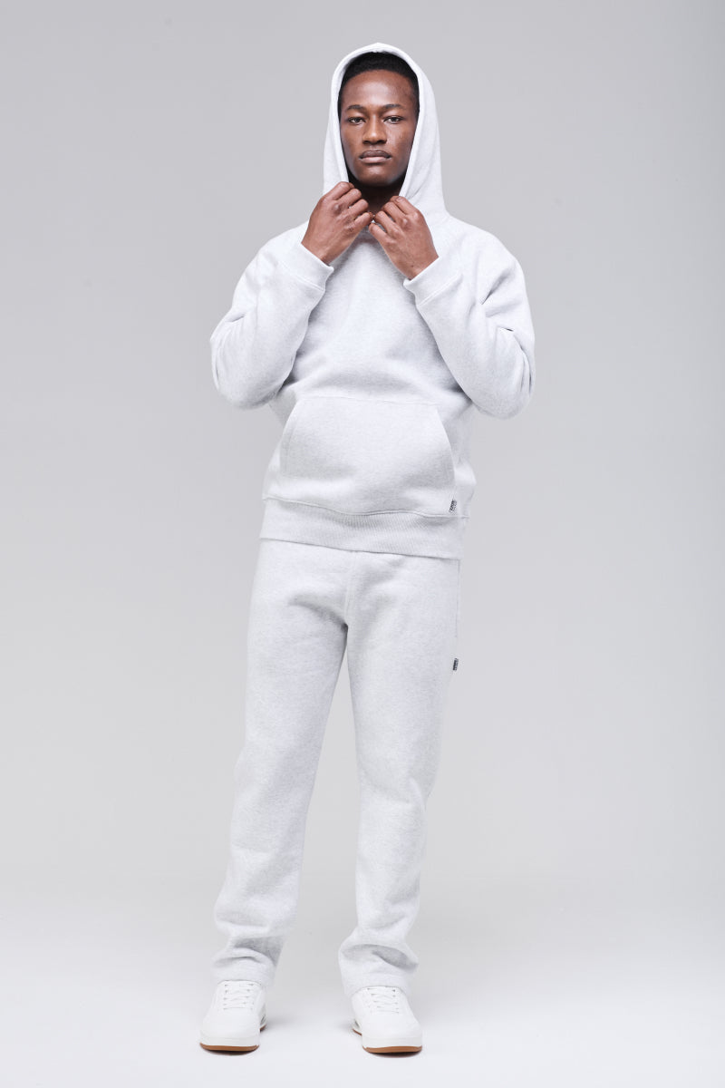 Front view, hands holding hood and collar