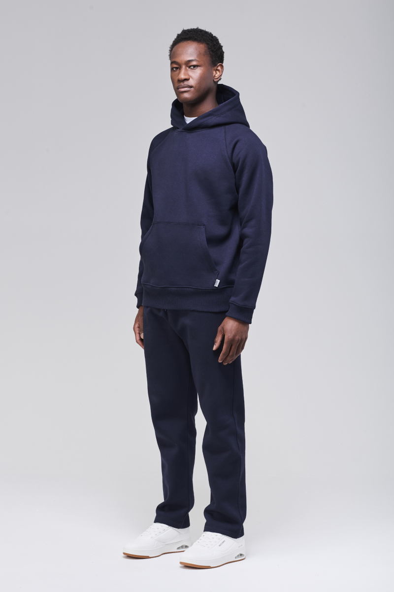 Angled front view, classic fit hoodie in heavyweight cotton blend