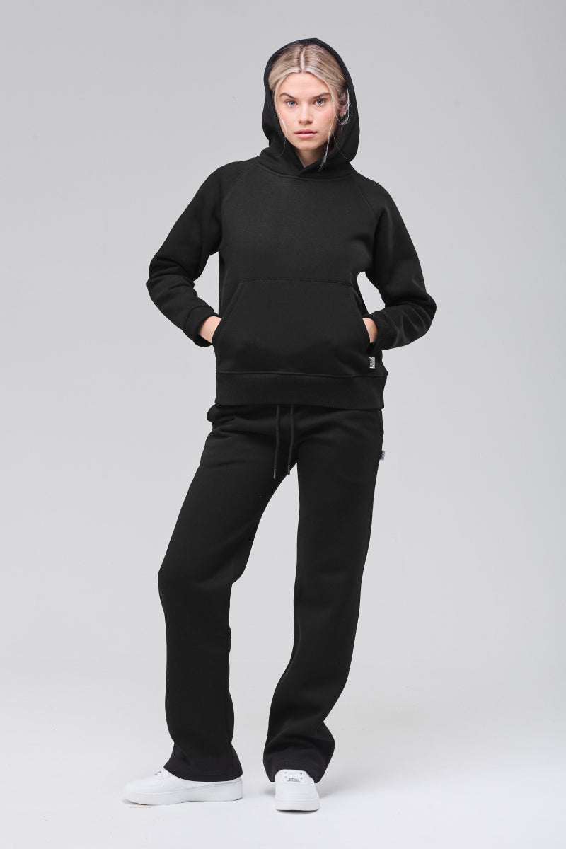 Sunday Superior Belmont hoodie front view, hands in pockets, hood up