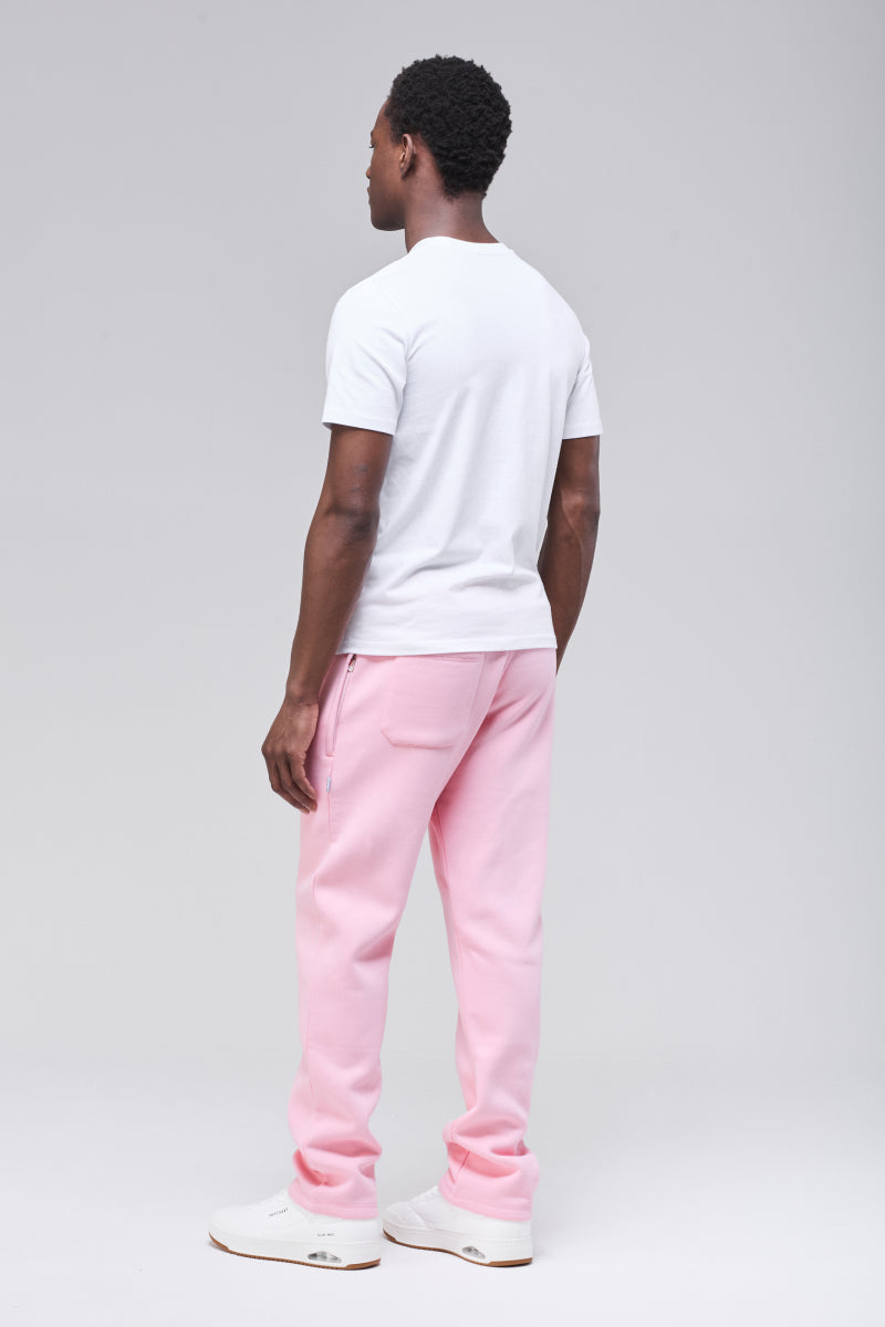 Angled back view of heavyweight, pink sweatpant