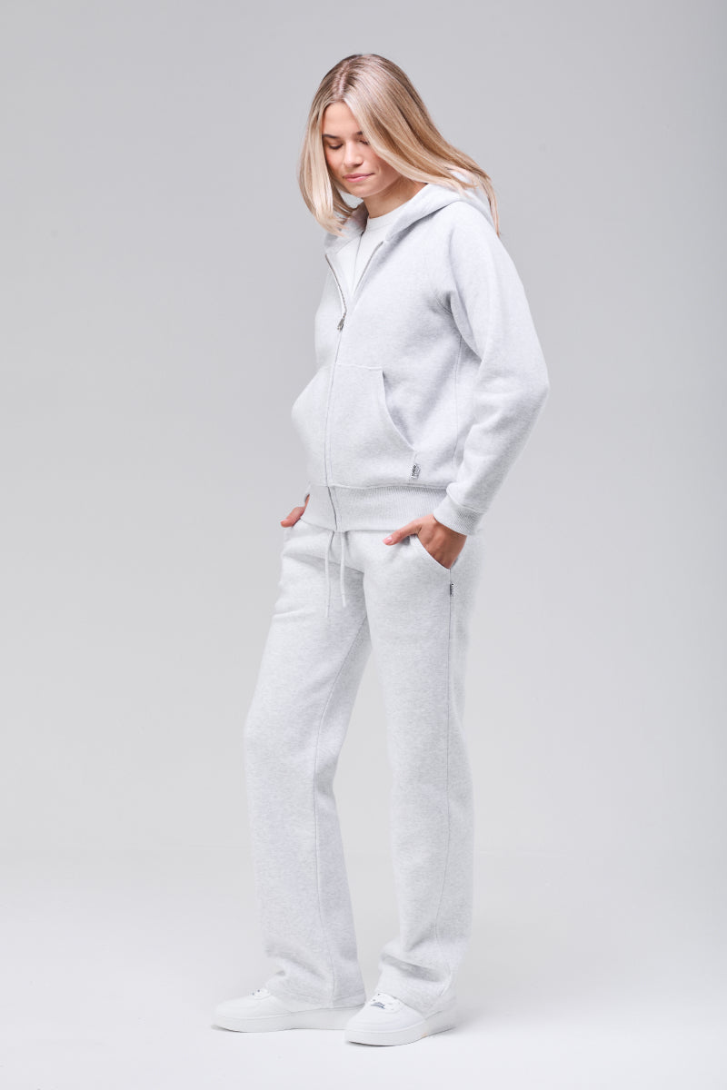Side view, grey zip hoodie full figure